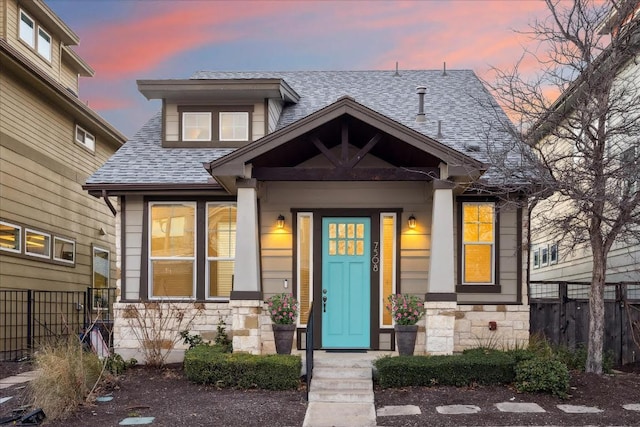 7508 Pantherpaw St, Austin, TX 78757 - view of front of property with stone siding and roof with shingles