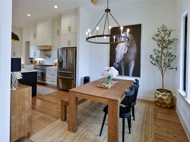 871 Blackbuck Ridge Dr, Lampasas, TX 76550 - dining area with recessed lighting, light wood-style floors, baseboards, and a chandelier