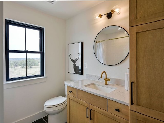 871 Blackbuck Ridge Dr, Lampasas, TX 76550 - bathroom featuring tile patterned flooring, baseboards, toilet, a shower with shower curtain, and vanity