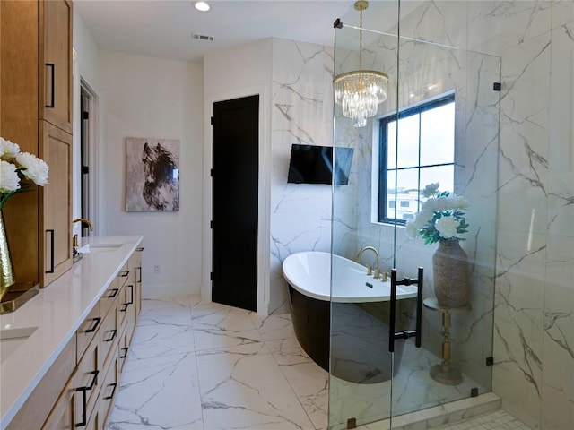 871 Blackbuck Ridge Dr, Lampasas, TX 76550 - bathroom with visible vents, a freestanding tub, marble finish floor, a sink, and recessed lighting
