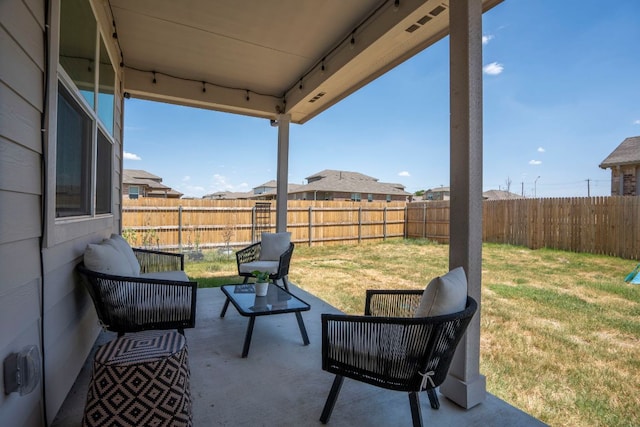 321 Cherry Laurel Ln, Kyle, TX 78640 - view of patio featuring a fenced backyard and an outdoor hangout area