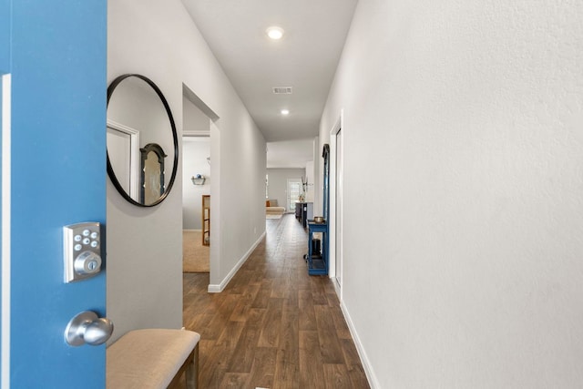 321 Cherry Laurel Ln, Kyle, TX 78640 - hallway featuring dark wood-style flooring, recessed lighting, baseboards, and visible vents