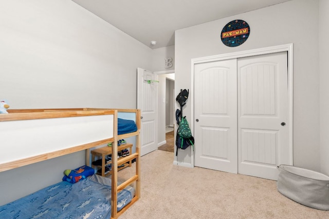 321 Cherry Laurel Ln, Kyle, TX 78640 - bedroom with carpet and a closet