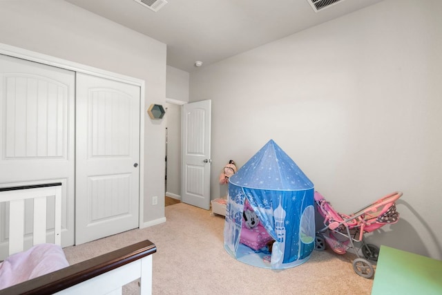 321 Cherry Laurel Ln, Kyle, TX 78640 - bedroom featuring baseboards, carpet, a closet, and visible vents