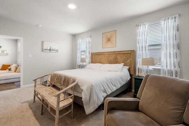 321 Cherry Laurel Ln, Kyle, TX 78640 - carpeted bedroom with baseboards