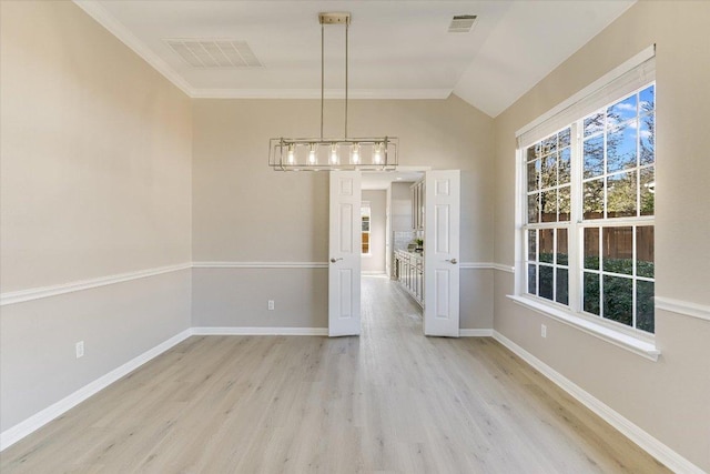 9201 Cessna Ln, Austin, TX 78717 - unfurnished dining area featuring light wood-type flooring, baseboards, vaulted ceiling, and ornamental molding