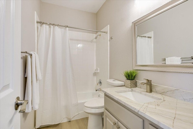 9201 Cessna Ln, Austin, TX 78717 - bathroom featuring vanity, shower / tub combo, wood finished floors, and toilet