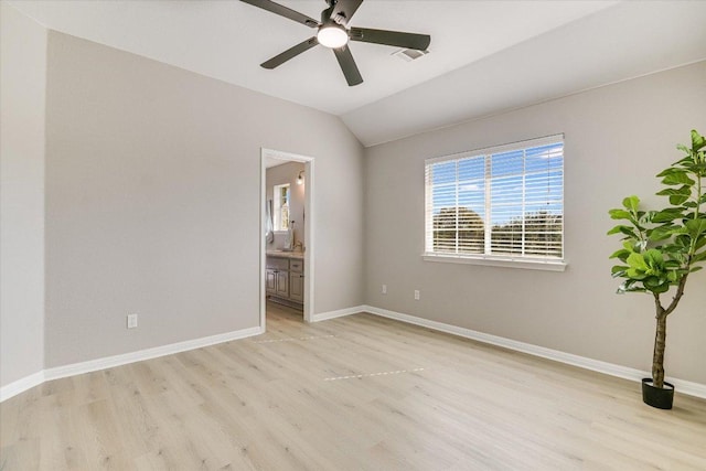 9201 Cessna Ln, Austin, TX 78717 - unfurnished room with light wood-style flooring, baseboards, ceiling fan, and lofted ceiling