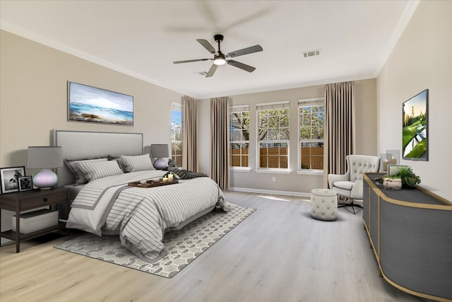 9201 Cessna Ln, Austin, TX 78717 - bedroom featuring wood finished floors, crown molding, baseboards, and ceiling fan