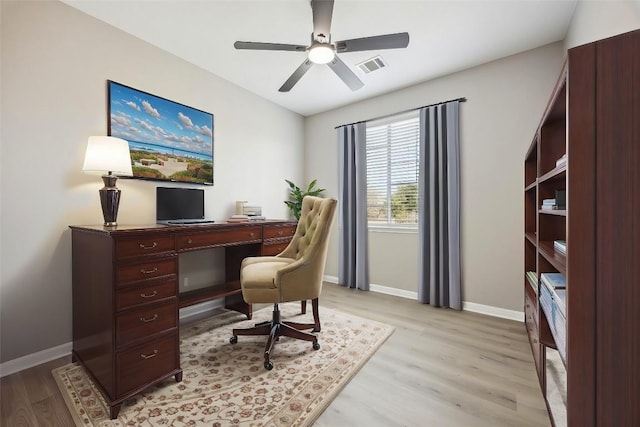 9201 Cessna Ln, Austin, TX 78717 - office area featuring light wood-style floors, baseboards, and a ceiling fan