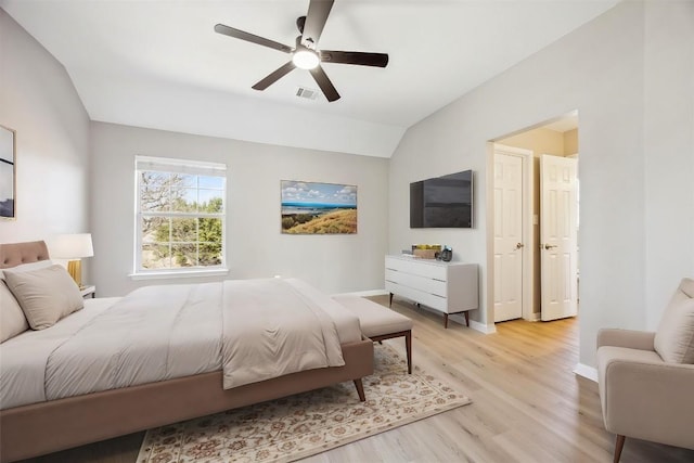 9201 Cessna Ln, Austin, TX 78717 - bedroom with light wood-style floors, lofted ceiling, baseboards, and ceiling fan
