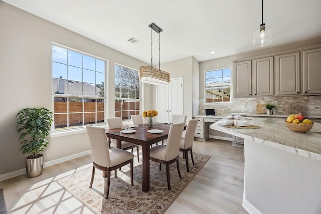 9201 Cessna Ln, Austin, TX 78717 - dining area with light wood-type flooring, baseboards, and recessed lighting