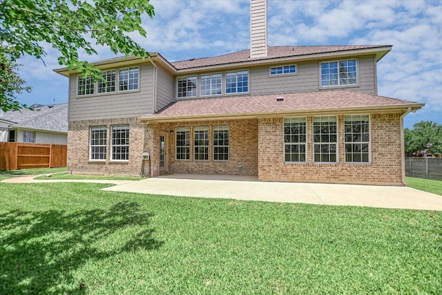 9201 Cessna Ln, Austin, TX 78717 - back of house featuring a patio area, a chimney, and brick siding
