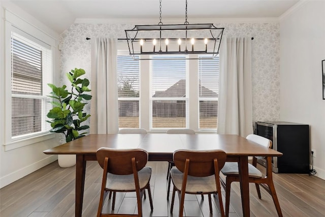 1737 Kerr Valley Ln, College Station, TX 77845 - dining room with wallpapered walls, crown molding, plenty of natural light, wood finished floors, and baseboards