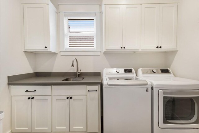 1737 Kerr Valley Ln, College Station, TX 77845 - laundry room with cabinet space and washing machine and dryer