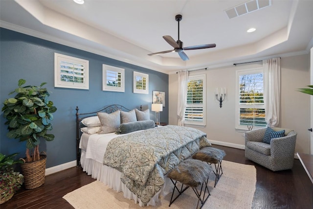 9525 Stratus Dr, Dripping Springs, TX 78620 - bedroom featuring a raised ceiling, dark wood-style flooring, baseboards, recessed lighting, and ceiling fan