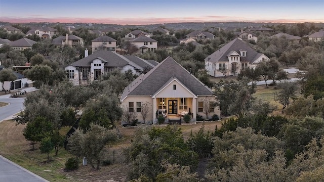 9525 Stratus Dr, Dripping Springs, TX 78620 - aerial view at dusk of a residential view