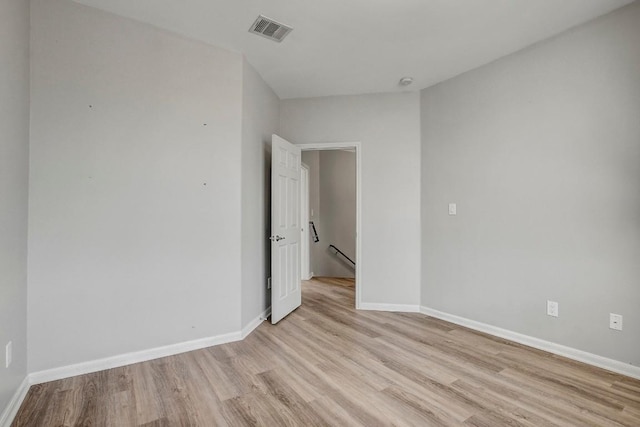 512 Eberhart Ln Unit 1207, Austin, TX 78745 - spare room with light wood-style floors and baseboards
