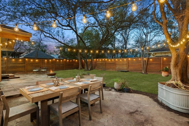 3506 Clearview Dr, Austin, TX 78703 - patio terrace at dusk with outdoor dining space, a patio, and a fenced backyard