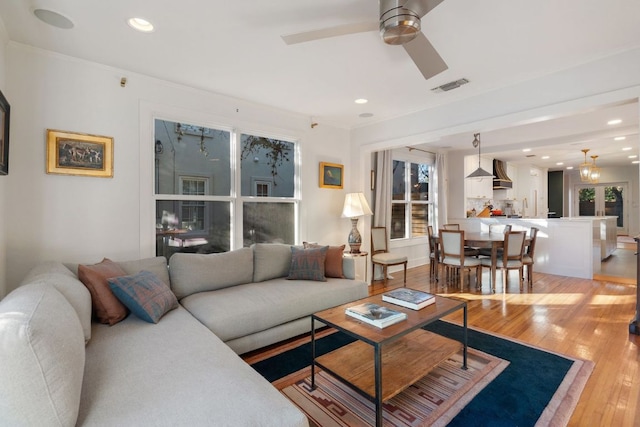 3506 Clearview Dr, Austin, TX 78703 - living room with light wood-style floors, ceiling fan, and recessed lighting