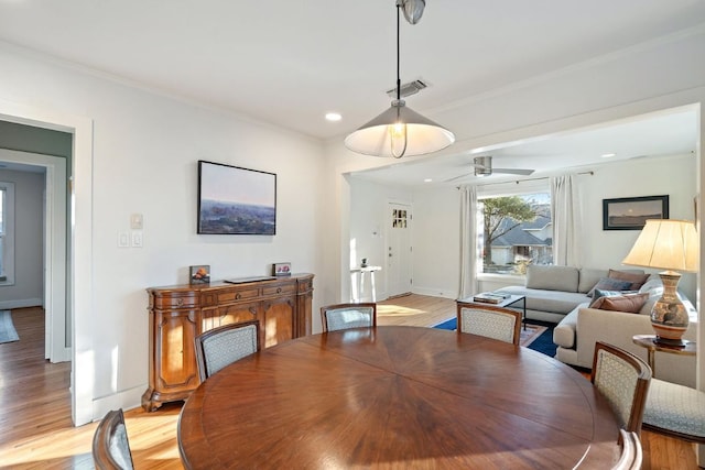 3506 Clearview Dr, Austin, TX 78703 - dining space with light wood-style flooring, ornamental molding, ceiling fan, and recessed lighting