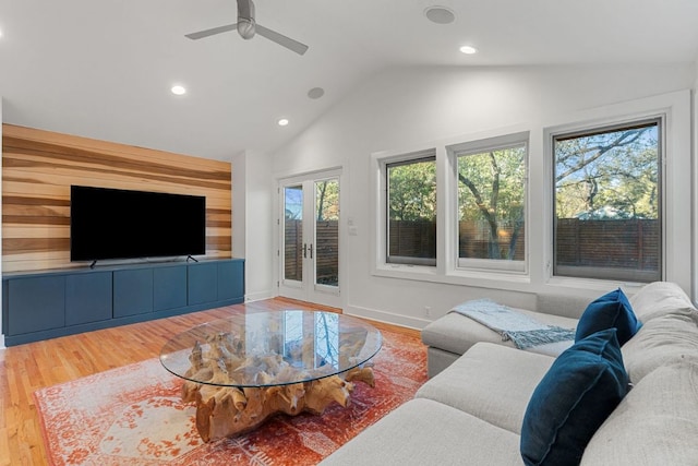 3506 Clearview Dr, Austin, TX 78703 - living room featuring vaulted ceiling, recessed lighting, wood finished floors, a ceiling fan, and french doors