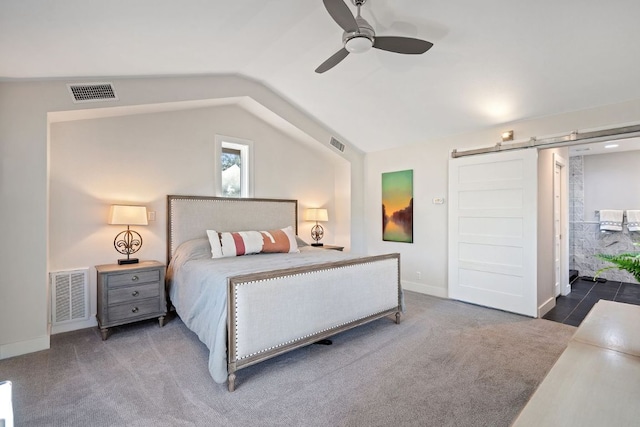 3506 Clearview Dr, Austin, TX 78703 - carpeted bedroom featuring a barn door, vaulted ceiling, and a ceiling fan
