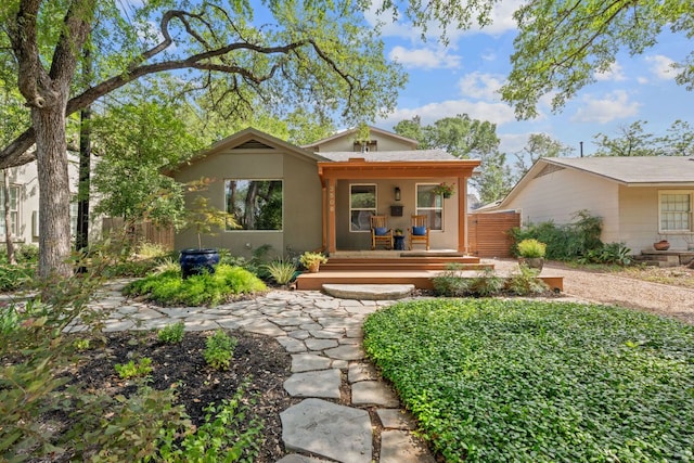 3506 Clearview Dr, Austin, TX 78703 - view of front facade featuring stucco siding and a porch