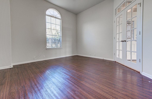 120 Mountain Laurel Way, Austin, TX 78737 - empty room featuring french doors, dark wood-style floors, and baseboards