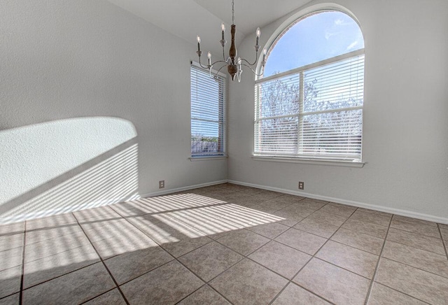 120 Mountain Laurel Way, Austin, TX 78737 - unfurnished room with a chandelier, tile patterned flooring, and baseboards