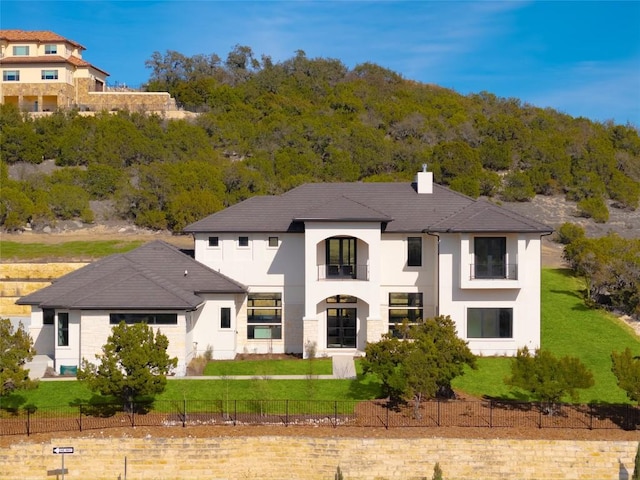 106 Bella Montagna Cir, Austin, TX 78734 - view of front of home featuring a chimney and stucco siding