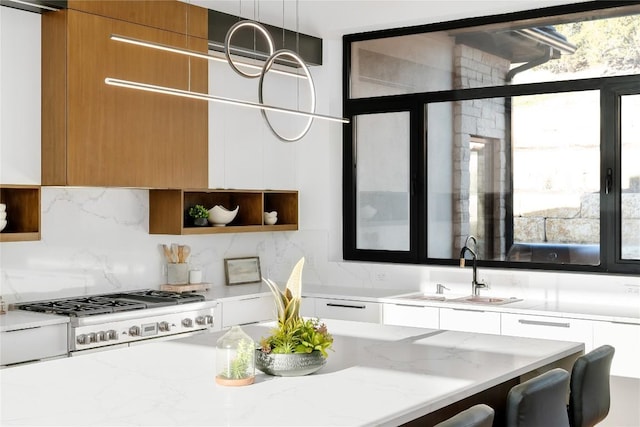 106 Bella Montagna Cir, Austin, TX 78734 - kitchen featuring modern cabinets, open shelves, white cabinets, and backsplash