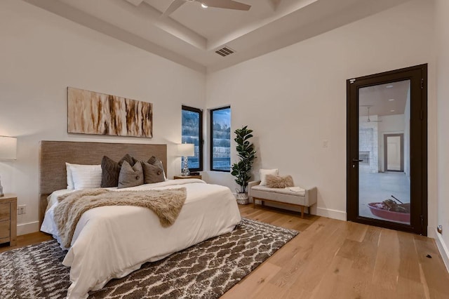 106 Bella Montagna Cir, Austin, TX 78734 - bedroom with wood finished floors and a ceiling fan