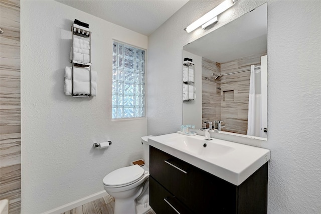 1205 Westmoor Dr, Austin, TX 78723 - full bathroom featuring toilet, vanity, baseboards, a textured wall, and curtained shower