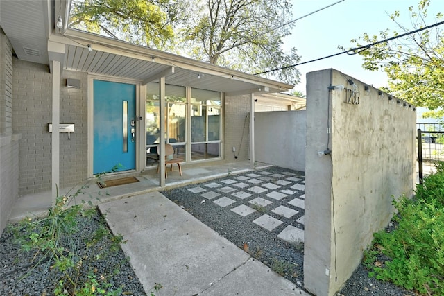 1205 Westmoor Dr, Austin, TX 78723 - view of exterior entry with brick siding