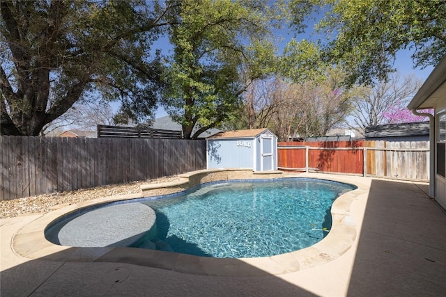 2103 Heather Dr, Cedar Park, TX 78613 - view of swimming pool with a fenced backyard and a storage shed