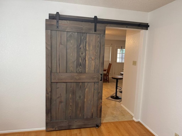 2103 Heather Dr, Cedar Park, TX 78613 - detailed view of a barn door and wood finished floors