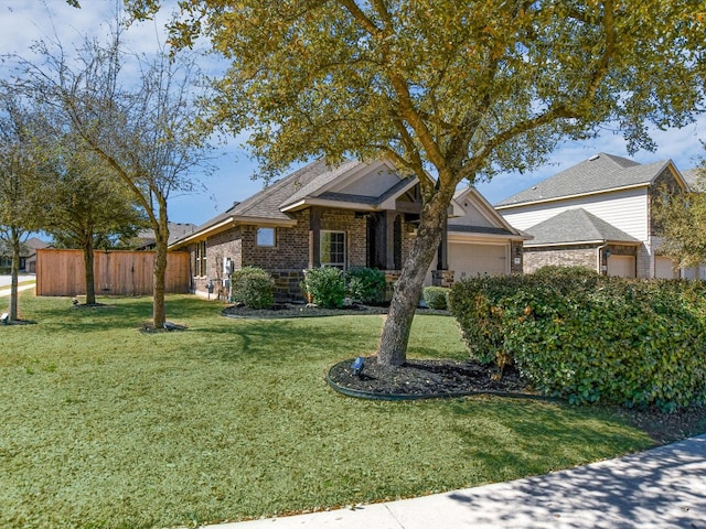 2829 Homecoming, Leander, TX 78641 - view of front facade with an attached garage, brick siding, and roof with shingles