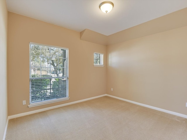 2829 Homecoming, Leander, TX 78641 - spare room featuring light carpet and baseboards