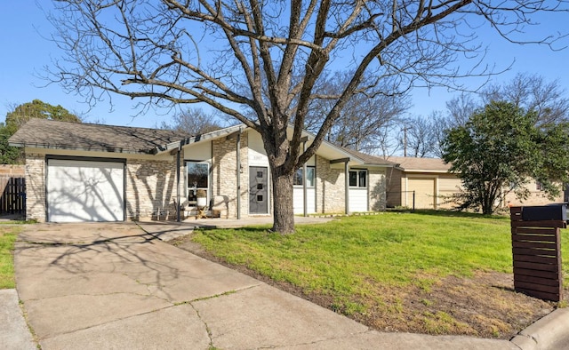 5307 Halmark Dr, Austin, TX 78723 - mid-century inspired home with a garage, concrete driveway, and brick siding