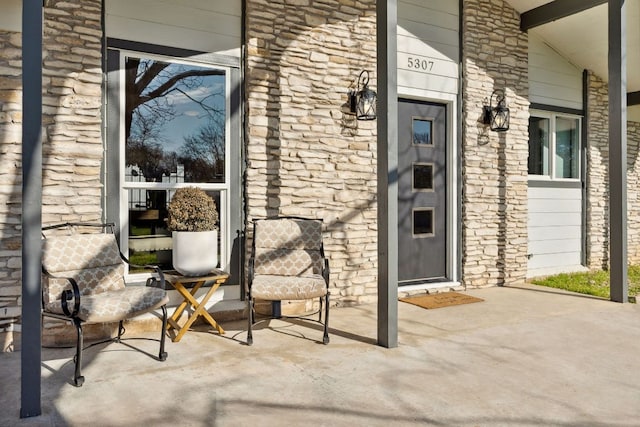 5307 Halmark Dr, Austin, TX 78723 - property entrance with stone siding and covered porch