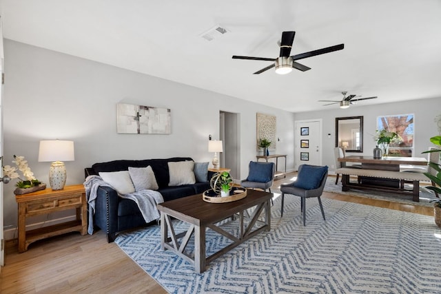 5307 Halmark Dr, Austin, TX 78723 - living room featuring light wood-style flooring and ceiling fan