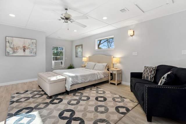 5307 Halmark Dr, Austin, TX 78723 - bedroom with light wood-style floors, ceiling fan, and recessed lighting