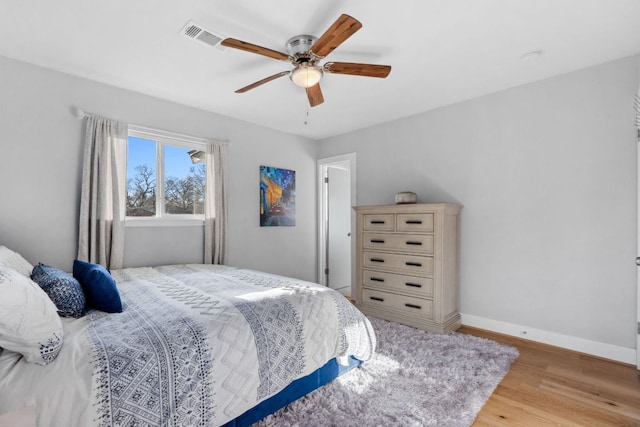 5307 Halmark Dr, Austin, TX 78723 - bedroom featuring light wood finished floors and a ceiling fan