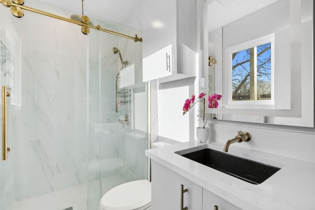 5307 Halmark Dr, Austin, TX 78723 - bathroom featuring a marble finish shower and vanity