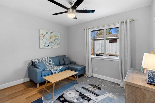 5307 Halmark Dr, Austin, TX 78723 - living room featuring a ceiling fan and wood finished floors