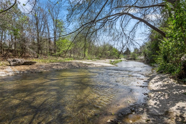 1304 Gatlinburg Dr, Pflugerville, TX 78660 - property view of water featuring a forest view