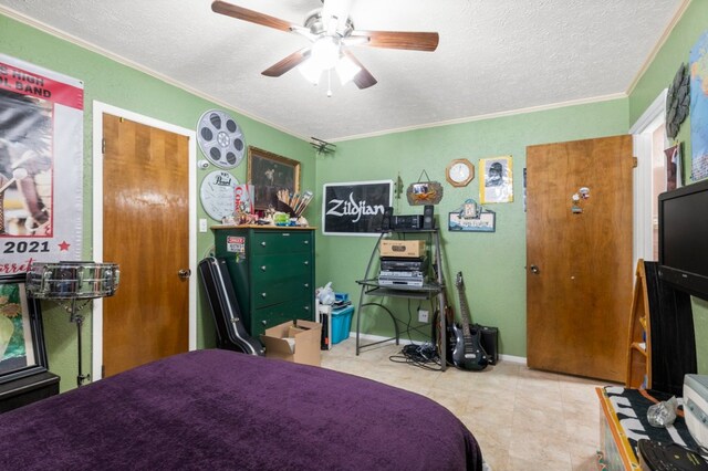 1304 Gatlinburg Dr, Pflugerville, TX 78660 - tiled bedroom featuring a ceiling fan, baseboards, a textured ceiling, and crown molding