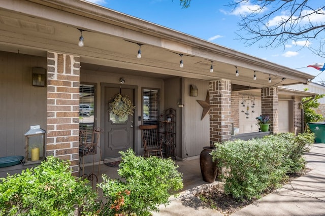 1304 Gatlinburg Dr, Pflugerville, TX 78660 - view of exterior entry with brick siding