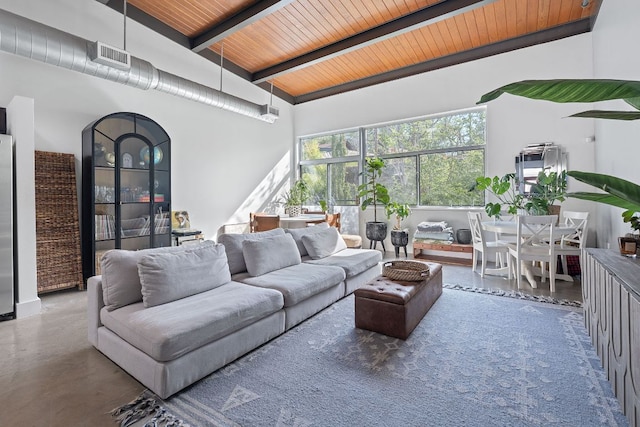 living room with wood ceiling, finished concrete floors, visible vents, a sunroom, and lofted ceiling with beams